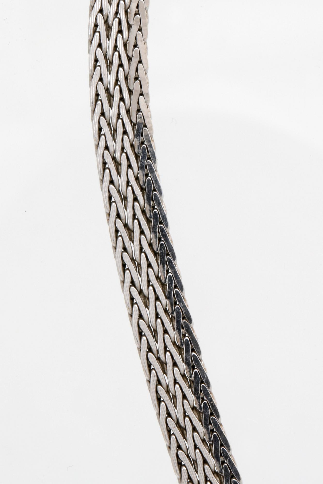 An 18K white gold chain, Unoaerre, Italy, 27g.