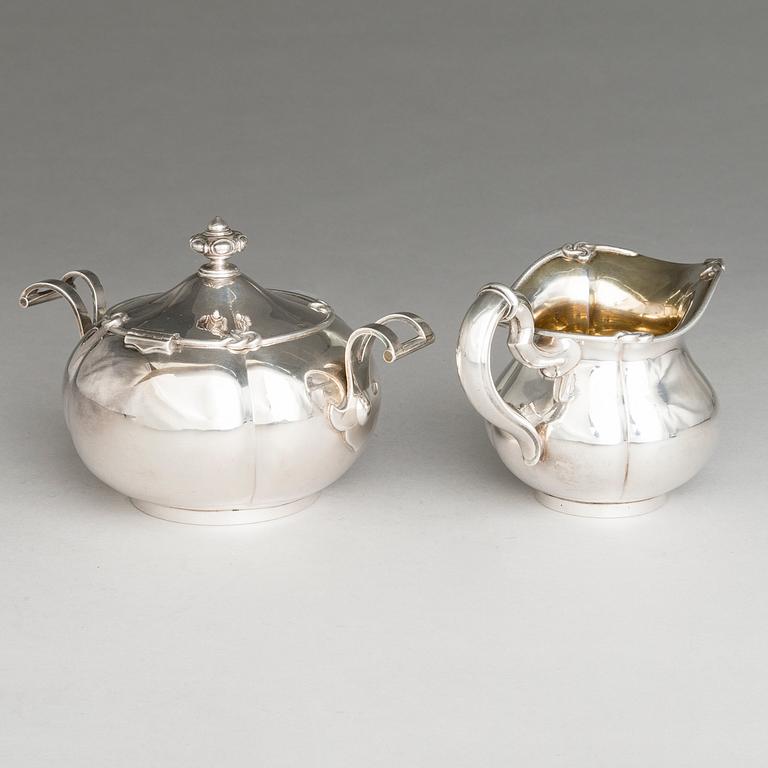 SAZIKOV, A 5-piece silver coffee and tea set, mark of the Sazikov Firm, Imperial Warrant, Saint Petersburg 1860.