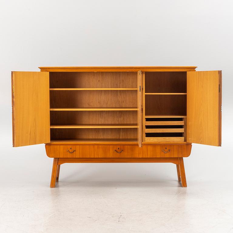 A Swedish Modern cabinet, 1940s/50s.