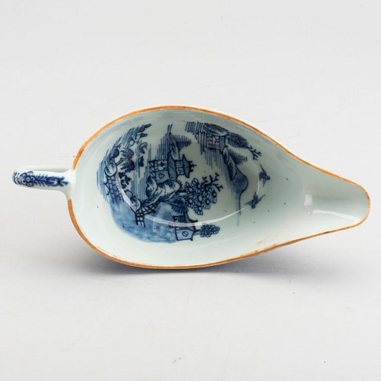 A Chinese porcelain Qianlong serving dish and saucer.