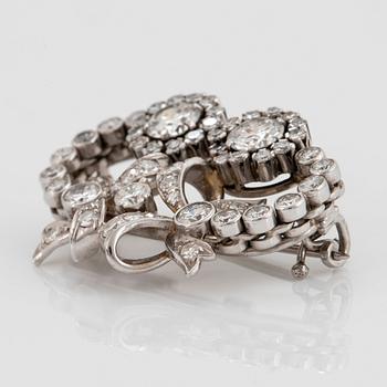 Brosch 18K vitguld med runda briljant- och åttkantslipade diamanter.
