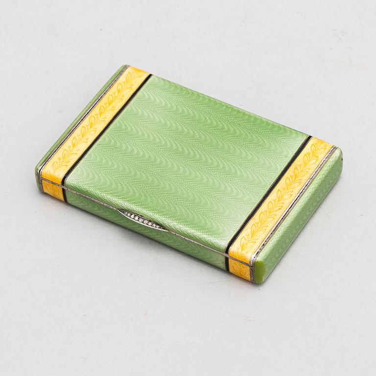 A gilded silver cigarette case with enamel and rose-cut diamonds. Moscow, early 20th century.