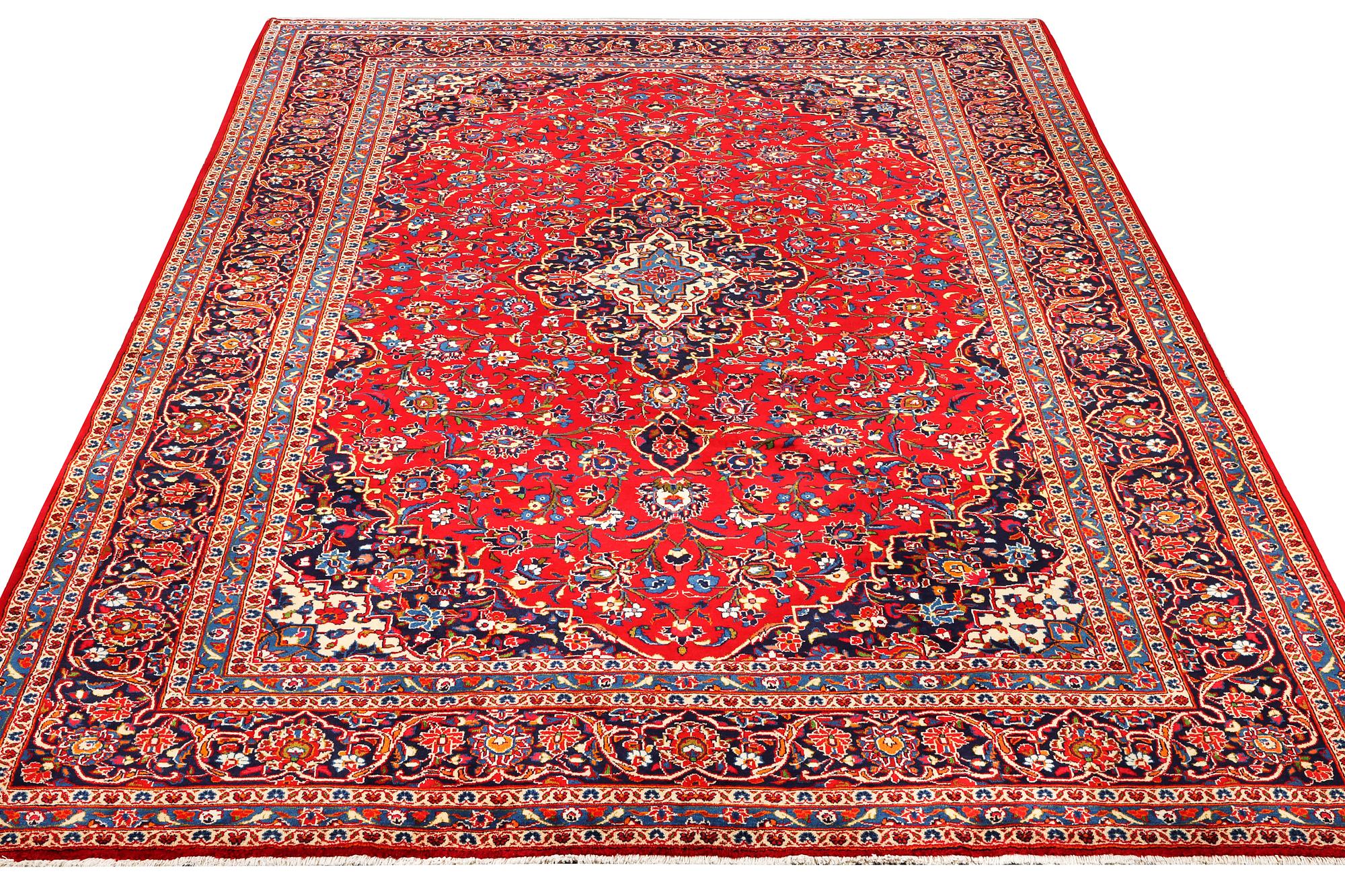 A Kashan carpet, c. 390 x 252 cm.