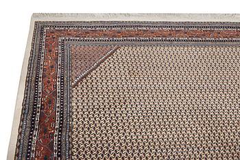 A carpet, Sarouk-Mir, c. 351 x 247 cm.