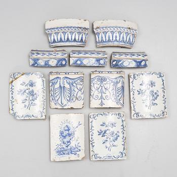 Eleven glazed earthenware tiles, 18th century.