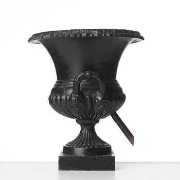 A Louis XVI-style garden urn, circa 1900.