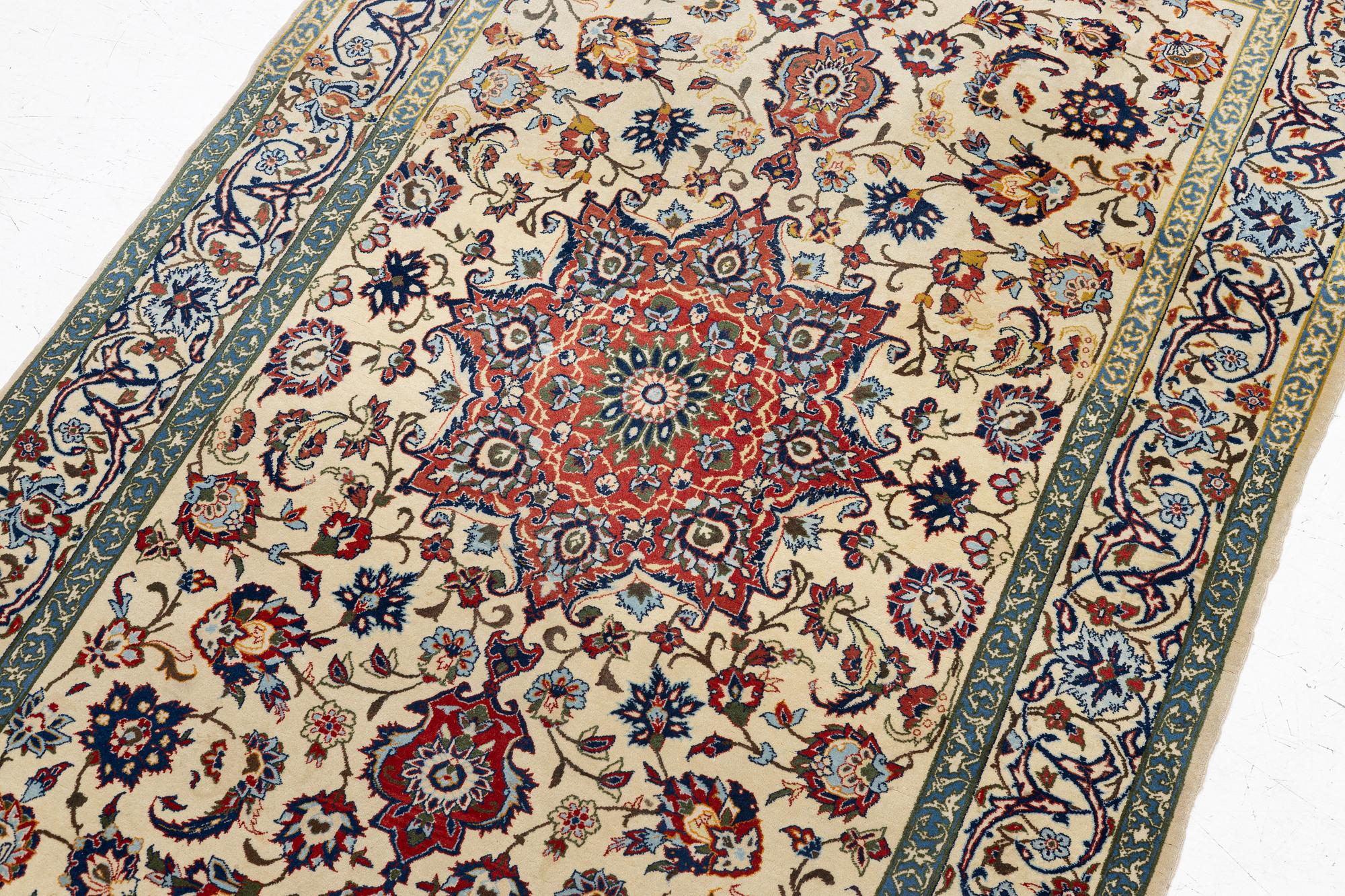 A Nain rug, c. 165 x 103 cm.