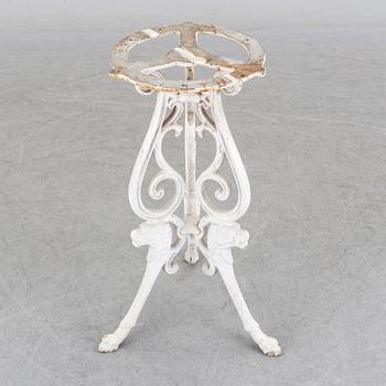 a late 20th century cast iron garden table.