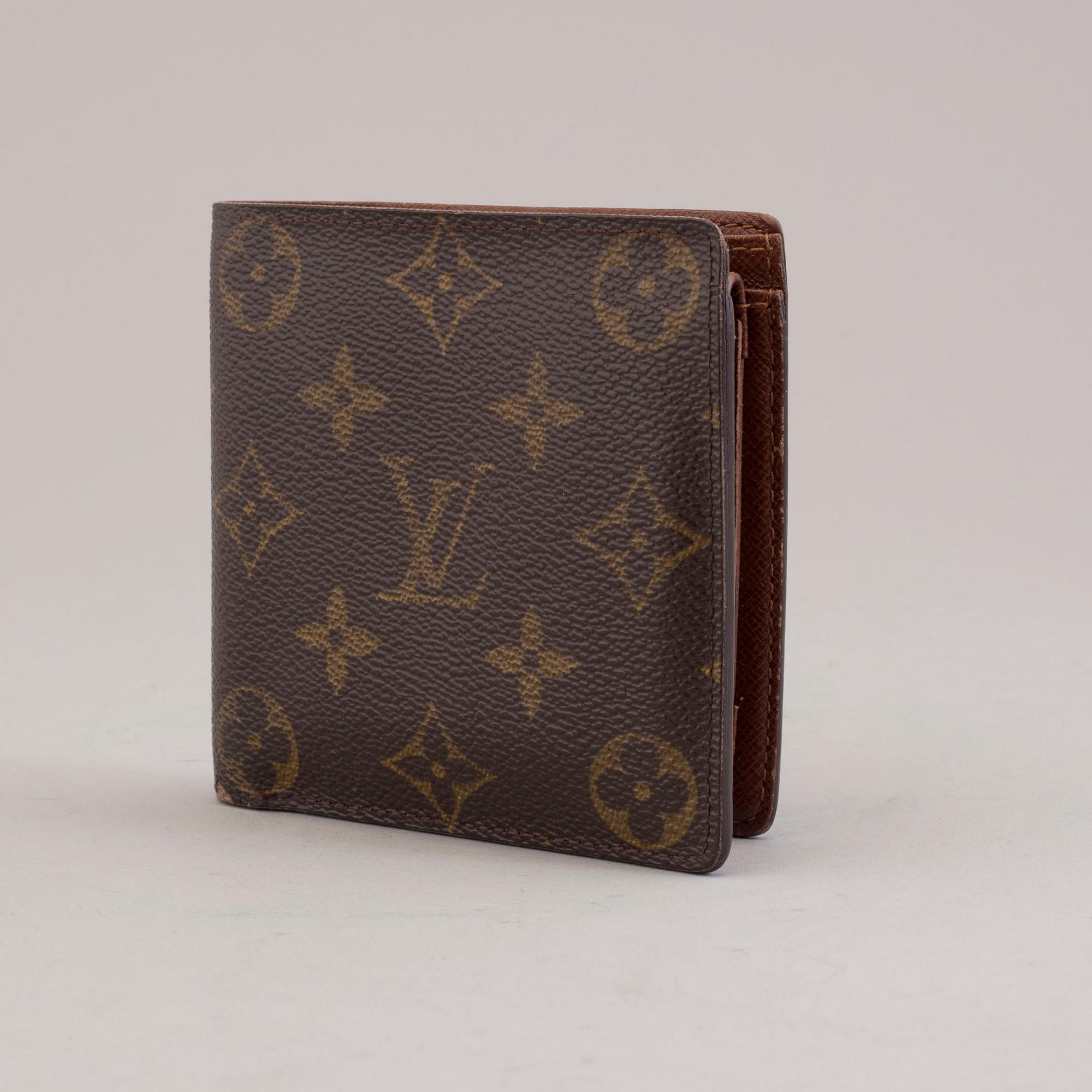 LOUIS VUITTON, a monogram canvas wallet.