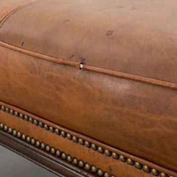 A CHESTERFIELD STYLE OTTOMAN, around year 2000.