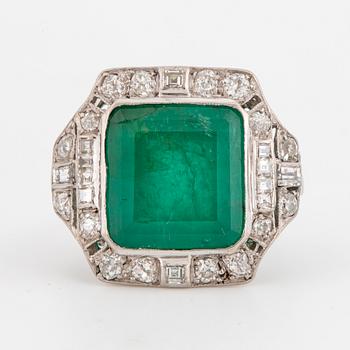 An art déco emerald and diamond ring.