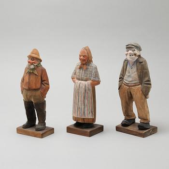 and CARL JOHAN TRYGG, three wooden sculptures, signed and dated, 1940s.