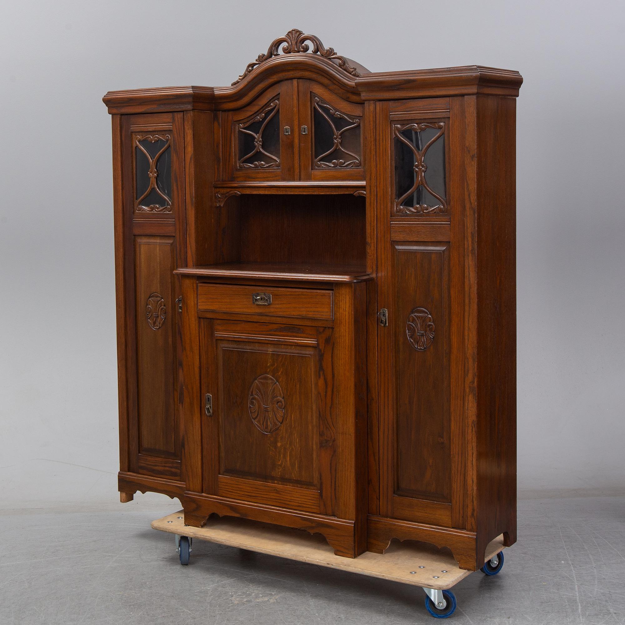 A second half of the 20th Century oak cupboard.