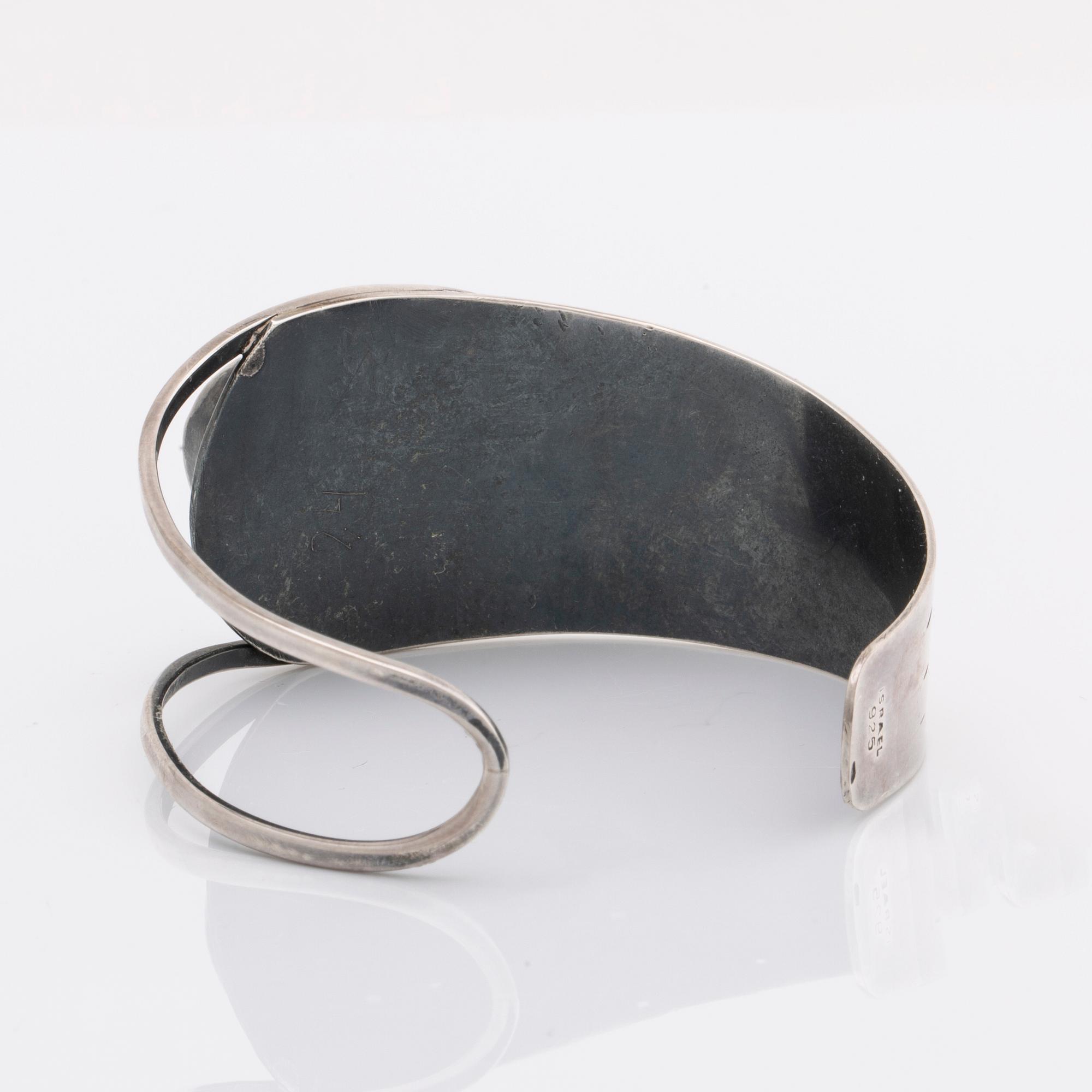 2 silver bracelets, 1 with a green stone, wider bracelet swedish import mark, original invoice dated 1977.