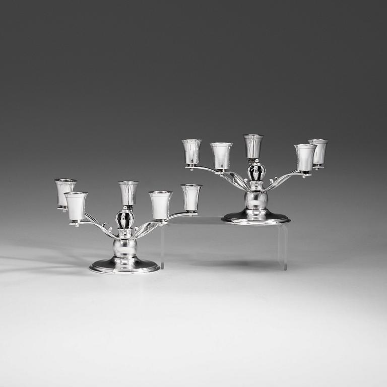 A pair of Grann & Laglye five branches silver candelabra, Copenhagen 1937.