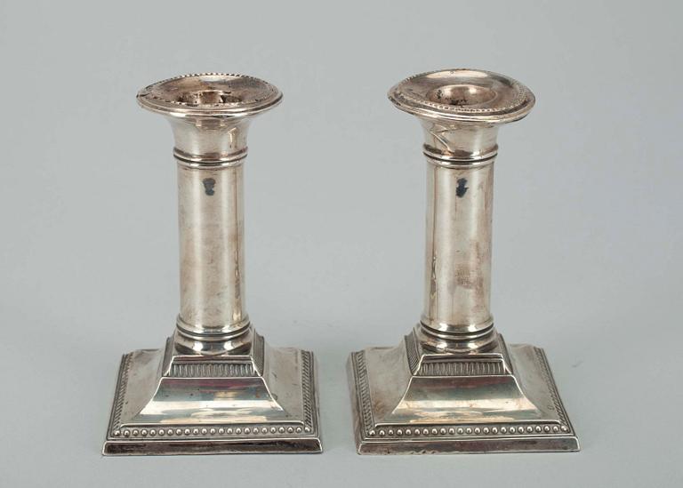 A PAIR OF CANDLESTICKS.