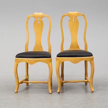 A mid 18th Century pair of rococo chairs.