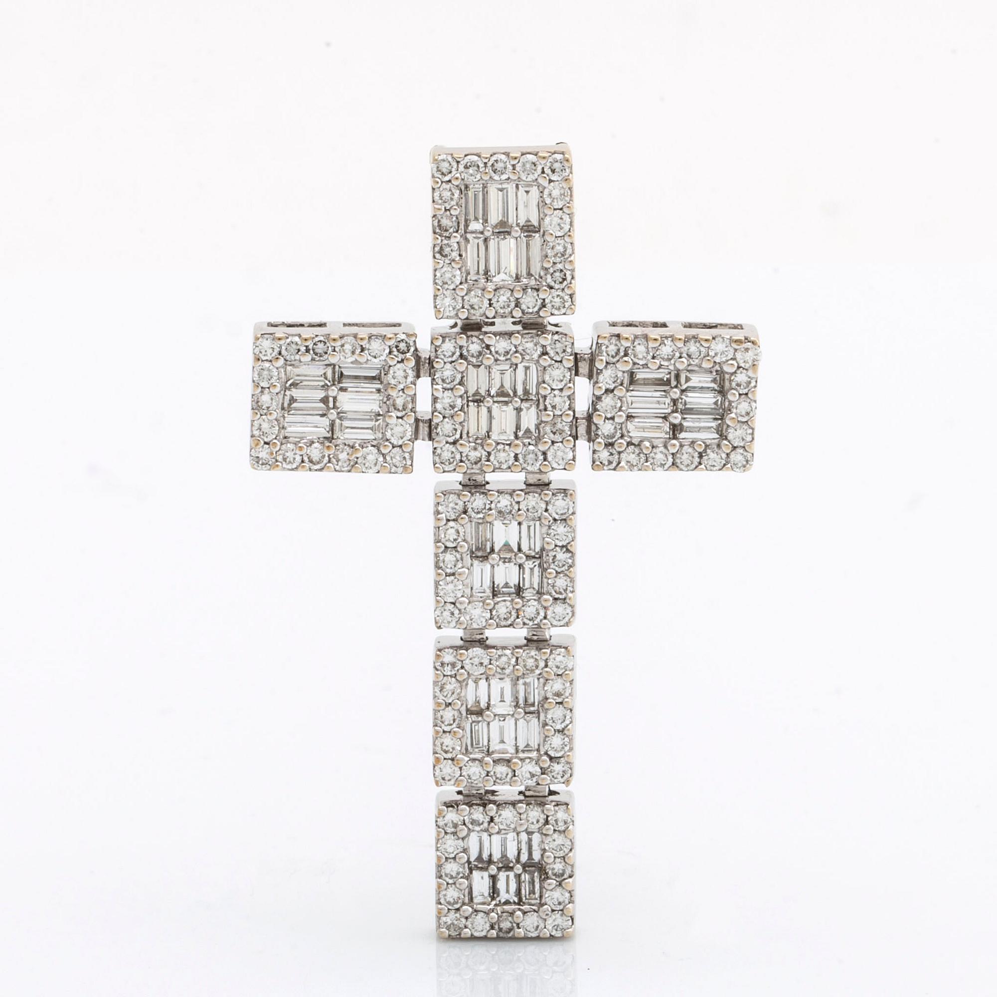 Diamantkors, 18K vitguld med briljanter och baguetter total vikt 2,89 ct enligt gravyr, ca 4,5 x 3 cm.