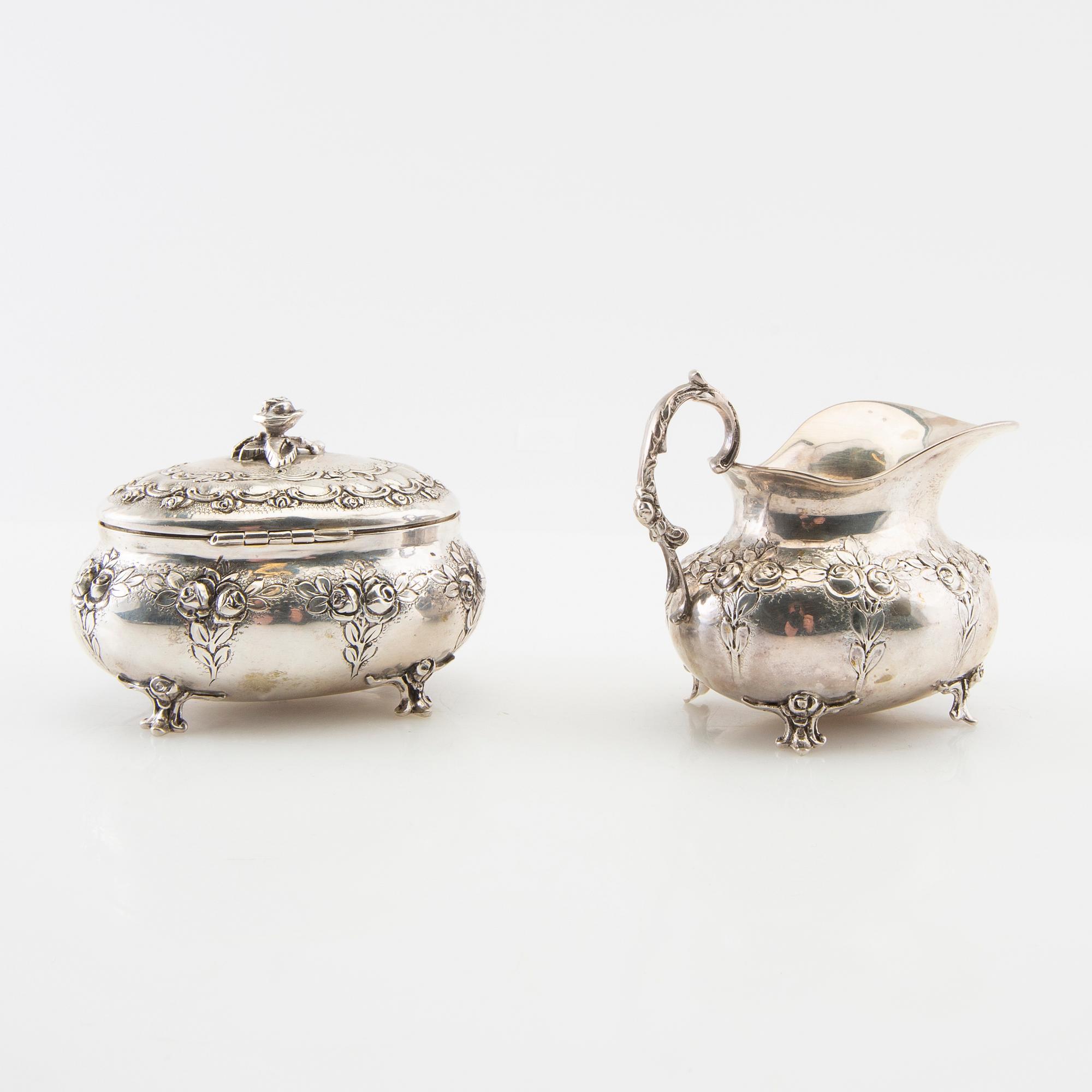 Sugar bowl, cream jug, tray and sugar tongs, 5 dlr silver, Swedish import marks, Rococo style.