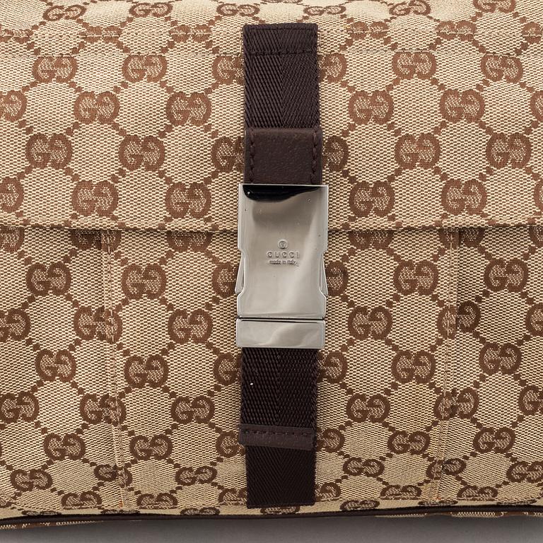 Gucci, a monogram canvas messenger bag.