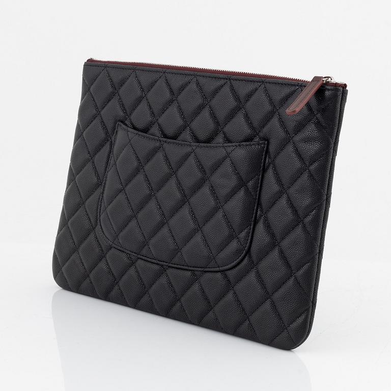 Chanel, a black caviar leather clutch, 2020.
