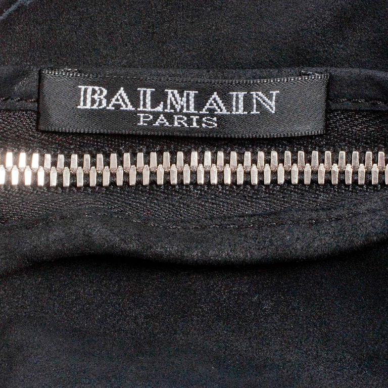 BALMAIN, a black suede dress.