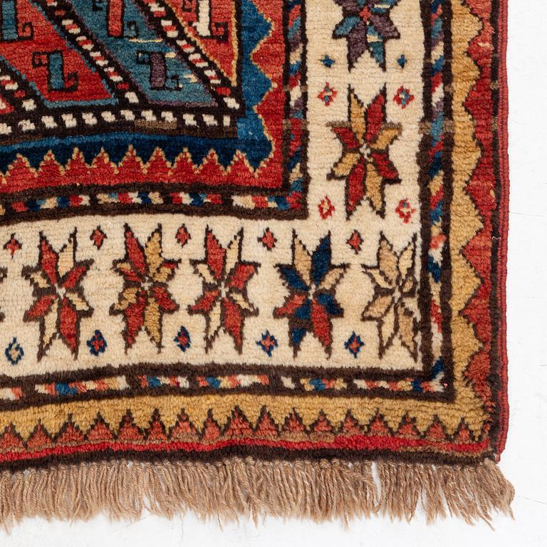 An antique Gendje rug, south Caucasus, c. 208 x 103 cm.