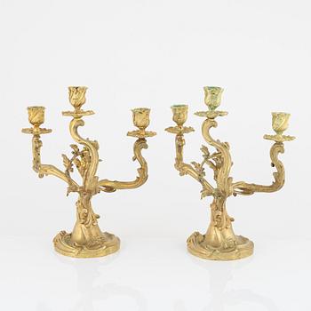 A pair of Rococo revival candelabra, second half of the 19th Century.