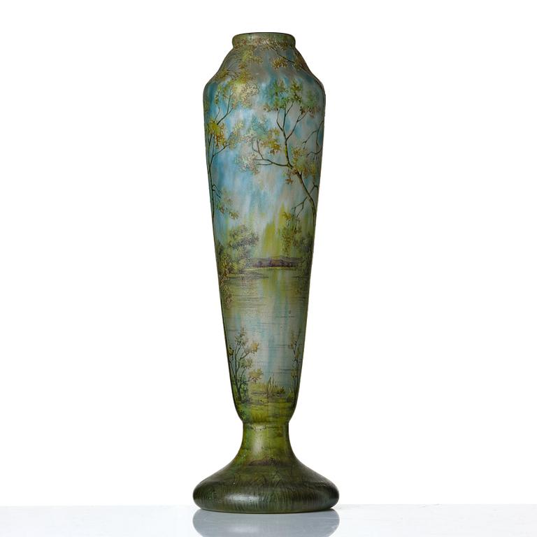 Daum, an Art Nouveau enamel painted cameo glass landscape vase.