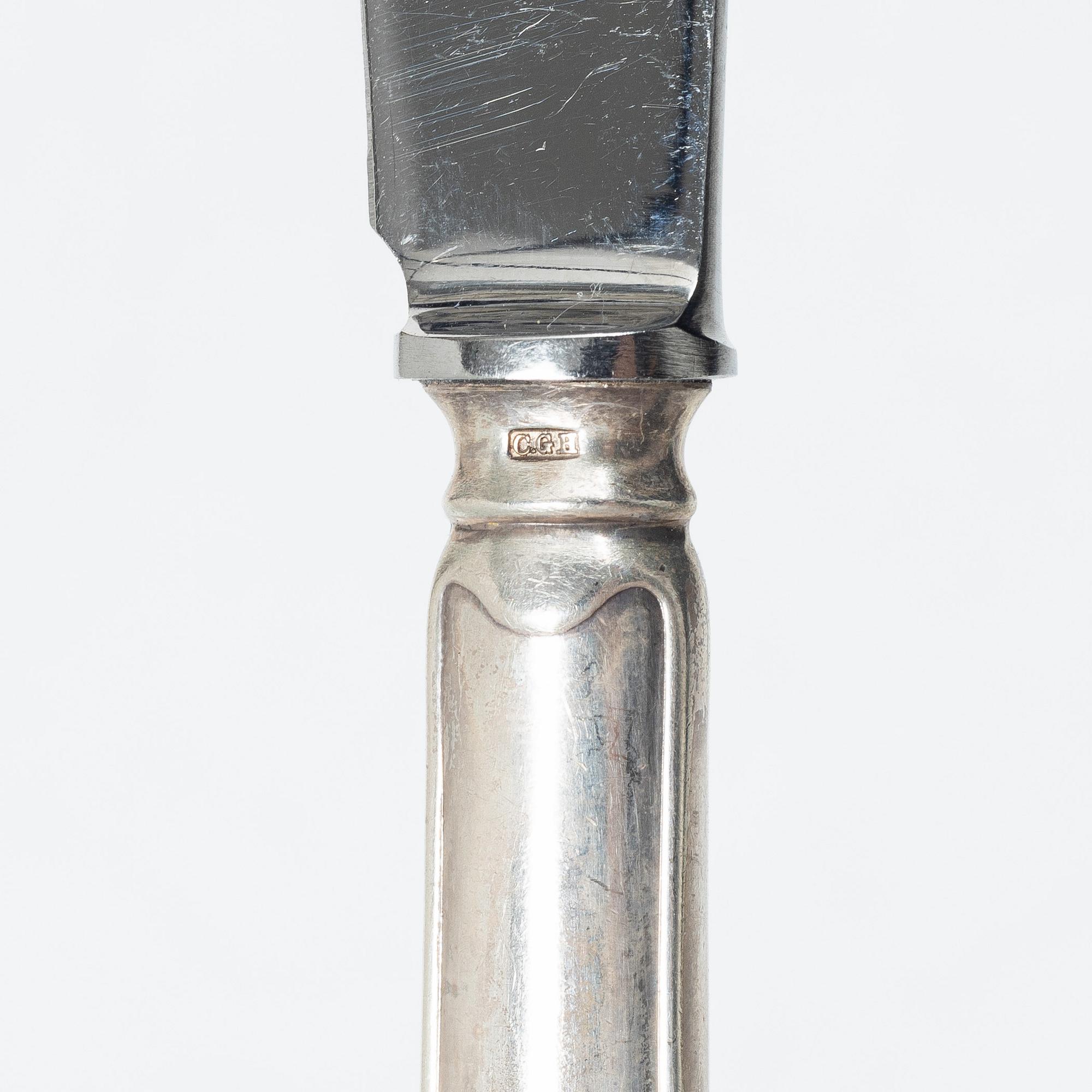 A 36 piece silver cutlery service, model Svensk Spets, mostly CG Hallberg, 1930s.