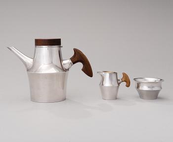 A coffee pot, sugar bowl and creamer signed TW. Silver 916, Kultakeskus, Hämeenlinna 1962 and -61.