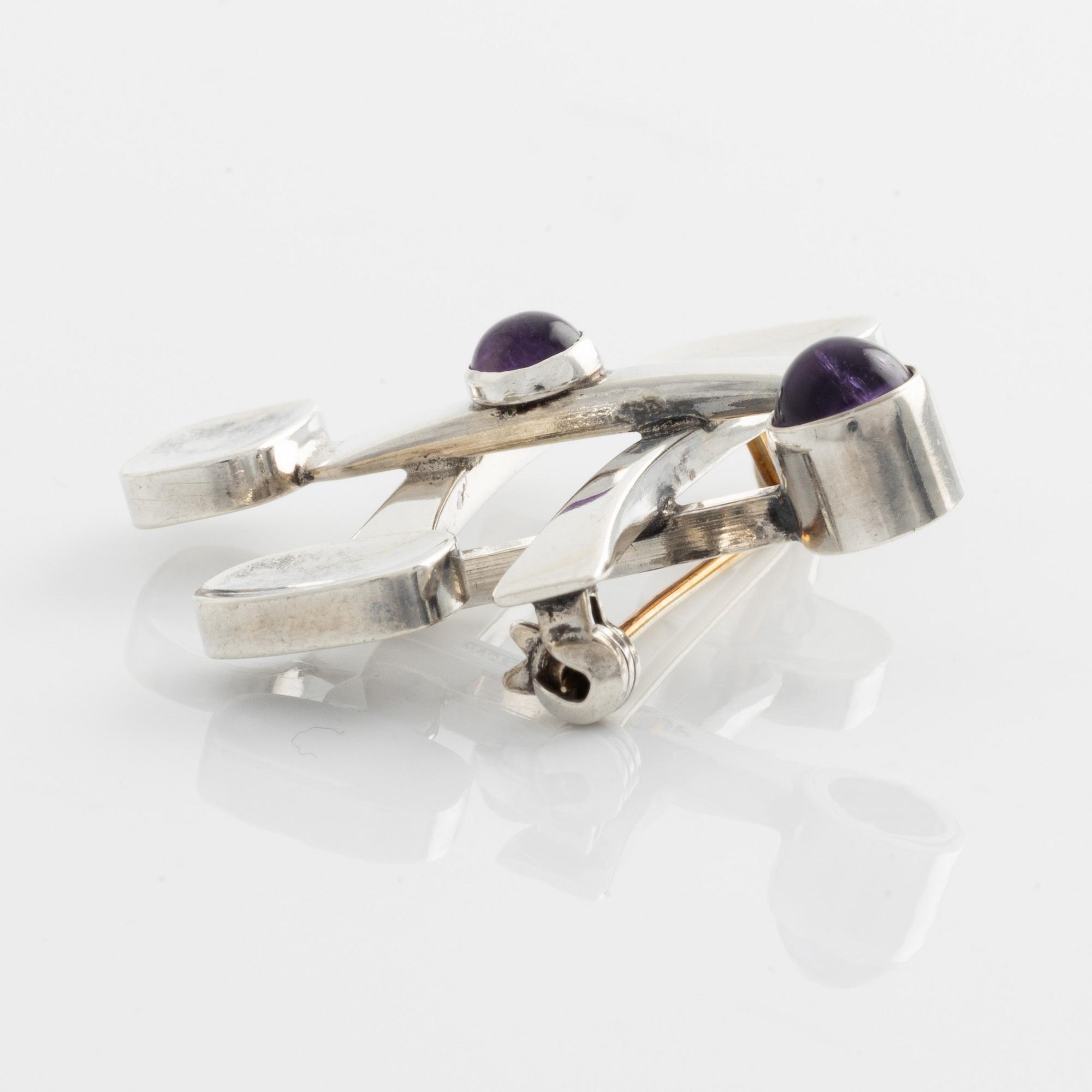 Arvo Saarela, brooch, silver with cabochon-cut amethysts.
