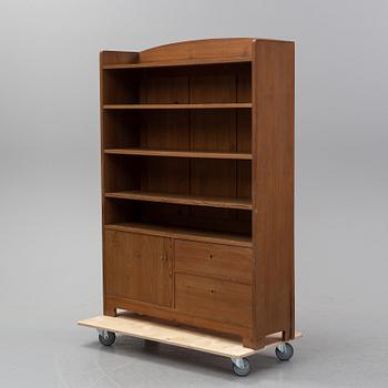 A stained pine bookcase attributed to Carl Westman, early 20th Century.