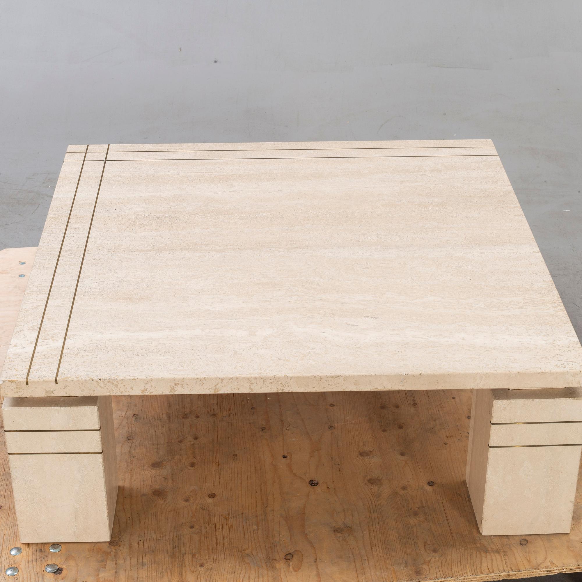 A 1970/80s travertin coffee table.