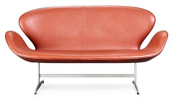 940. An Arne Jacobsen brown leather and aluminium "Swan" sofa, Fritz Hansen, Denmark.