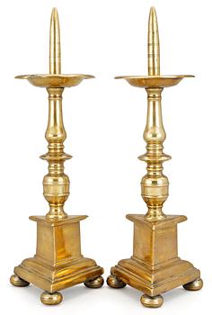 1032. A pair of Baroque altar candlesticks.