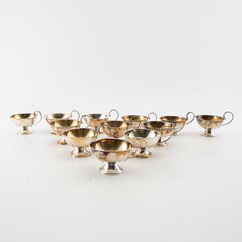 Punchmuggar, 12 st, silver, bl.a. CESONS, Göteborg 1974.