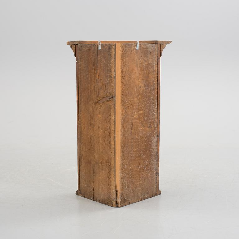 A folk corner cabinet dated 1779.