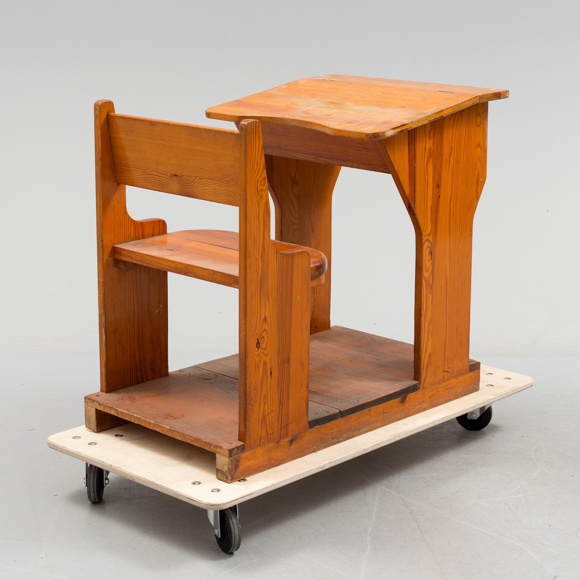 A first half of the 20th century school bench.