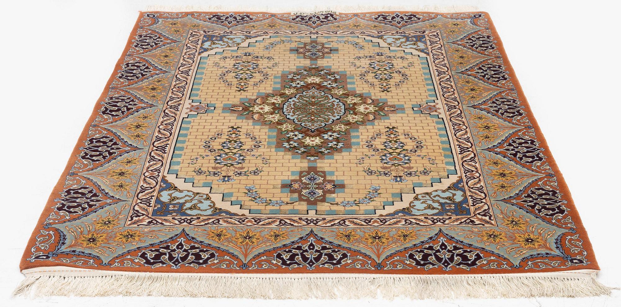 A part silk Isfahan rug, Central Persia (Iran), signed 163 x 108 cm.