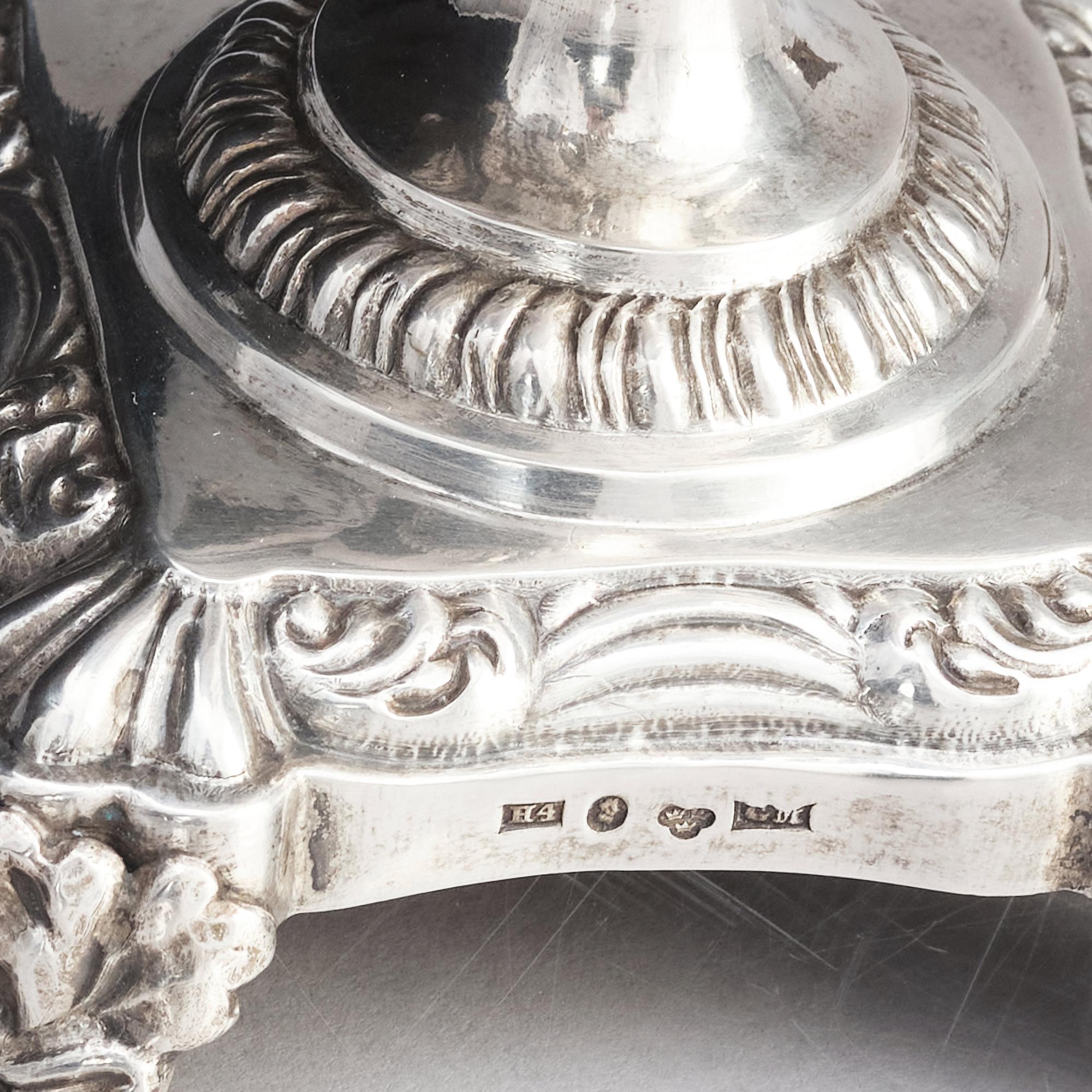 A Swedish pair of salt cellars, parcel-gilt silver, marks of Gustaf Möllenborg, Stockholm 1838.