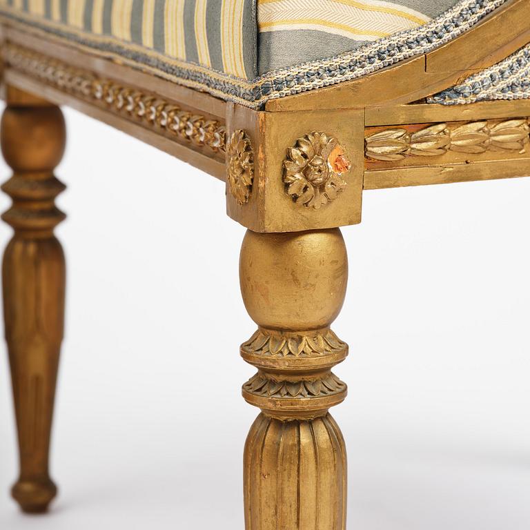 A pair of late Gustavian open armchairs attributed to E. Ståhl (master in Stockholm 1794-1820).