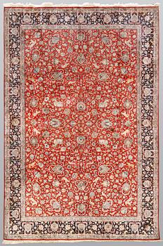 A pictoral orientalisk silk carpet, ca 284 x 180 cm.