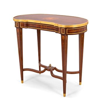 A Directoire style marquetry table from around year 1900.