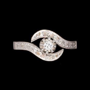 RING, 14k vitguld med briljantslipad diamant ca0,12ct. Vikt 3,4g.
