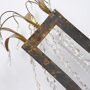 A pair of Russian Louis XVI-style  four-branch gilt bronze appliques, 19th century.