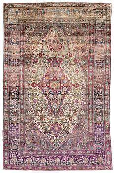 477. An antique silk Kashan rug, Central Persia, c. 207 x 131 cm.
