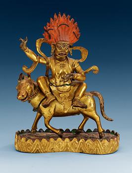 1482. A Sinotibetan gilt metal figure of Palden Lhamo, 18/19th Century.