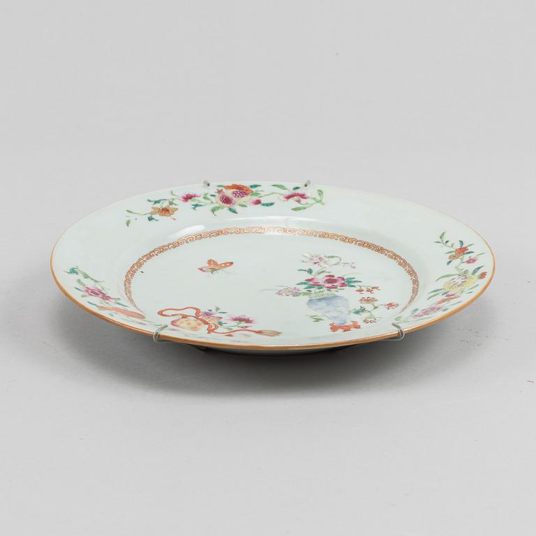A famille rose dish and two dinner plates, Qing dynasty, Qianlong (1736-95).