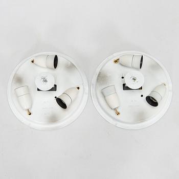 A pair of mid-20th century 'EA 72 ceiling lights for Itsu.